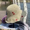 Breda randen hattar sommarstrån hatt strand eleganta blommor väver hink för kvinnor ihåliga andningsbara anti-uv resor sol