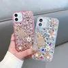 Luxury Bling 3D Rhinestone Case na iPhone 15 14 Pro Max 13 12 11 XR XS X 8 7 6 Plus Soft TPU Shinny Diamond Flower Love Heart Crystal Phone Pokrywa Modna Skóra Skóra