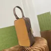 2022 Bolsos de diseñador para hombre Bolsos originales Bolsos pequeños de lujo Bolso para teléfono móvil Cartera de mano para mujer Monedero de embrague Patrón de letra es un famoso diseño conjunto