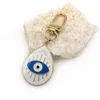 Creative Devil's Eye Keychain Fashion Blue Eye Jewelry Bag Bag Кламеры подвесные аксессуары автомобиль Care Key Ring