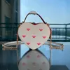 Bolsos de noche Diseñadores Bolsos de hombro Moda Mujer Coabag de lujo Cartera Marcas famosas Bolso Bolsos de mujer Bolso cruzado Cadena de cuero Corazón de amor