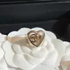 Love Hollow Heart-Shaped Ring Ladies Classic Luxury Designer Jycken Kvinnor M￤ssing Titanium Steel Alloy Gold Plated Fade Never Fade No Allergies H￶gkvalitativa smycken