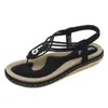 Sandales vacances plage bord de mer femmes tissé métal mode chaussures plates confortables chaussures d'été bande élastique décontracté