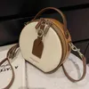 Ny kopplingsväska 5A Design One-Shulder Women's Bag Fashion Messenger Texture Högkvalitativ handhållen liten rund väska