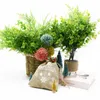 Kwiaty dekoracyjne sztuczne rośliny plastikowe do notatników wazony wystrój domu paproć eukaliptus