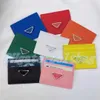 Luxurys Designers Mens Short Model Triangle Wallets Card Holder Women's äkta läder märkesvarade hela lyxinnehavare Coin2312