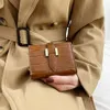 Fashion luxury patent leather short purse women's new Korean version of two fold crocodile wallet students everything folding card bag