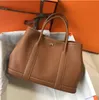 2023 5A Designer sacs Garden Party Sac À Main Qualité Grande Capacité Sac À Provisions Mode Classique À La Main Togo En Cuir Femmes Véritable Luxe Sur Mesure