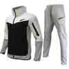 Calças de treino masculinas femininas de grife jogger Conjunto de roupas esportivas Impressão NK Tech Jaqueta casual Calças soltas camuflagem jogger com zíper