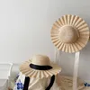 Cappelli 202204-lele Ins Summer Beach Ombra fatta a mano in paglia a tesa ondulata Holiday Street Kids Girl Hat Sun Cap Bambini Tempo libero