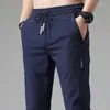 Pantalons pour hommes Sportswear Homme Jogging Séchage rapide Mince Stretch Cordon Streetwear Casual Belle Mode Été Style Coréen Hommes 1062