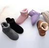 Australiska designer klassiska knappar snöstövlar helt nya kvinnor mini halva boot usa gs 58503 vinter full päls fluffy päls satin ankel boots booties tofflor