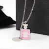 Moda damska projektant kolczyki naszyjnik tytanowa stal luksusowy styl różowe diamenty perfumy butelka miłość wisiorek biżuteria hurtowych