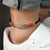 Cavigliere Cavigliera in pelle vintage con piume Accessori per ciondoli in lega da donna per uomo Bracciale in corda morbida nera rossa fatta a mano Gioielli per regali di coppia