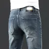 Cal￧a jeans de jeans cal￧a cal￧a cal￧a masculina estirada de outono de outono jeans de jeans de algod￣o lava-lados de neg￳cios retos casuais hs9610