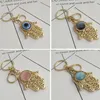 Creative Fatima's Hand Keychain Pendant Versione coreana Devil's Eye Bag Car Jewelry Portachiavi Accessori regalo