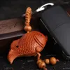 Keychains 10Pcs Cute Fish Pendant Keychain Peach Wood Vintage Charms Christmas Gift Car Key Chain Women Men Jewelry