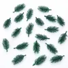 装飾的な花100pcs人工植物松の枝クリスマスツリーウェディングデコレーションdiyハンドクラフトアクセサリー子供ギフトブーケ