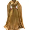 Elegant Muslim Gold Evening Dresses Appliques Shiny Beaded Cape Long Sleeves A Line Floor Length Prom Party Gowns Arabic Dubai Islamic Formal Wear 2023