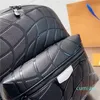 2022 Bolsas de pacote de bolsas masculinas e femininas Impressão de mochilas de impressão de desenho de modelo neutro da bolsa de luxo para homens mochilas mochilas moda mochilas