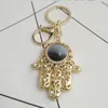 Creative Fatima's Hand Keychain Pendant Versione coreana Devil's Eye Bag Car Jewelry Portachiavi Accessori regalo