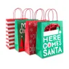 Enveloppez Noël avec poignée Sacs de kraft vert rouge Stripe Snowflake Imprimé de Noël Sac en papier cadeau Souety