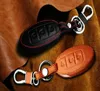 سلسلة مفاتيح السيارات المصنوعة من الجلد الأصلي لعام 20112013 2014 2015 Juke 3 Buttons Smart Key Cover Cover Cover Bey Chain Ring Auto Tuto Accessories5418041
