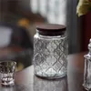 Garrafas de armazenamento jarro de vidro europeu com tampa moderna begônia alívio de padrões de cereal de cereal de café com mesa de café gabinete de mesa de mesa