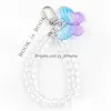 Nyckelringar Crystal Butterfly Keychain Transparent p￤rla Lanyards Key Ring f￶r Bling Hand Wrist Rem Rep Cord Holder Drop Delivery Jew Dhiyq