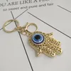 Creative Fatima's Hand Keychain Pendant Versione coreana Devil's Eye Bag Car Jewelry Portachiavi Accessori regalo