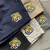 Heren shorts Tiger Badge Human Made Shorts Men Women 1 1 hoogwaardige strand losse casual shorts Ademende T221129 T221129