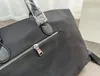 Diseñador 46 cm Reedición 2005 Nylon negro Bolsa de viaje Bolso de mano Bolso de mano para mujer Bolso de equipaje Bolso de compras Monedero de gran capacidad Paquete Impresión de letras