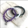 Bracelet en aigue-marine naturelle de conception perlée de qualité supérieure, tourmaline noire Om, tendance, améthyste, charme de Bouddha, livraison directe Dhgarden Dhjbf