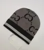 Caps Snow Beanies Dames Men Men Winter wollen petten met aangevinkte gebreide mode ski unisex merk schedel warme hoed 5501