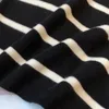 Женский свитер Черный белый рисунок полосы на плеча