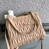 Designers nouveau style Adoptez le sac gracieux en peau d'agneau importé supérieur Couche de séparation à glissière centrale Raccords en laiton Sacs de mode