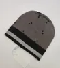 Caps Snow Beanies Dames Men Men Winter wollen petten met aangevinkte gebreide mode ski unisex merk schedel warme hoed 5501