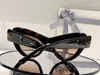 Óculos de sol femininos para homens homens de sol dos óculos 0204 Estilo de moda protege os olhos lente UV400 com caixa aleatória e estojo