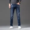 Calça jeans de jeans calça calça calça masculina estirada de outono de outono jeans de jeans de algodão lava-lados de negócios retos casuais kf9919