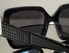 Dames zonnebril voor vrouwen Men Sun bril Heren 21x Modestijl Beschermt ogen UV400 -lens met een willekeurige doos en case