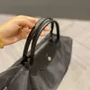 Lyxdesigner väskor läder tygväskan kvinnor handväska nylon axel väska crossbody klassisk stor kapacitet shopper svart 3 storlekar mycket bra trevligt