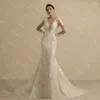 Illusion O Neck Długie rękaw koronkowy suknia ślubna dla kobiet 2022 Bride Summer Sexy Backless Bridal Boho Gown