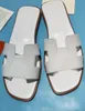 słynne marki kapcie plażowe sandały klasyczne płaskie obcasy letnie projektant moda klapy skórzane lady slajdy butów hotel w kąpieli seksowne sandały duże 35-42 A1
