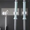 Haczyki samoprzylepne wielofunkcyjne montowane naścienne mop mop organizer uchwyt na toalet moth haczyk kuchnia wiszący mocny stojak