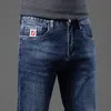 Calça jeans de jeans calça calça calça masculina estirada de outono de outono jeans de jeans de algodão lava-lados de negócios retos casuais kf9919