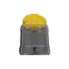 Bouteilles de stockage bouteille de miel Portable de haute qualité 2 kg/2.5 kg/3 kg PET de qualité alimentaire jaune couvercles à rabat pot en plastique pour 2 pièces/4 pièces