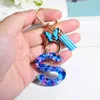 Keychains Fashion Heart Fyllt Harts Letter Keychain Tassel Kvinnor Handv￤ska Charm Blue Fj￤ril