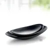 Учебные посуды наборы 1PC Пластина Овальная слитованая черная японская японская димсам -морепродукты имитация фарфоровых фарфоров