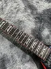 Lvybest Guitare électrique chinoise Couleur noire Système de trémolo duplex Corps en forme de chauve-souris
