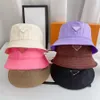 En peluche De Luxe Hommes Femmes Designer Pêcheur Chapeau Triangle Seau Chapeau Marque De Mode P Femmes Bonnet Six Couleurs De Haute Qualité